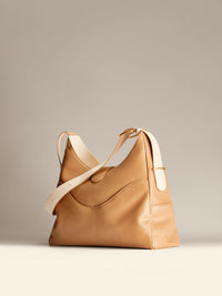 OLEADA Mini Hobo Bag > Women Leather Bag For All Occasions > multiple interior and exterior pockets with a laptop compartment > 13 inch laptop bag > convertible to shoulder bag Reverie Hobo Toffee