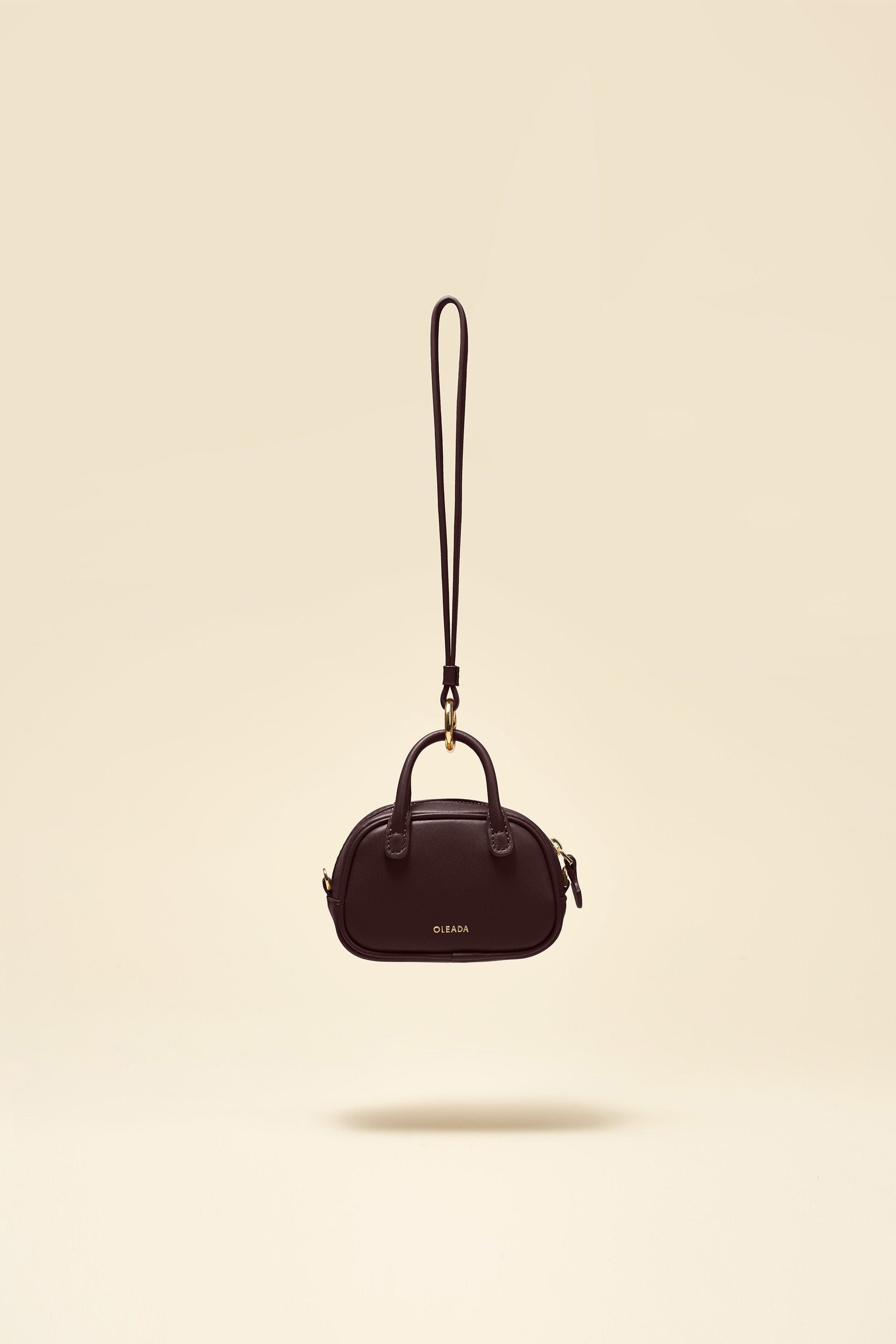 OLEADA NYC Apparel and Accessories > Women > Small Leather Goods > Leather Case Color_Chocolate Marina Carryall Charm