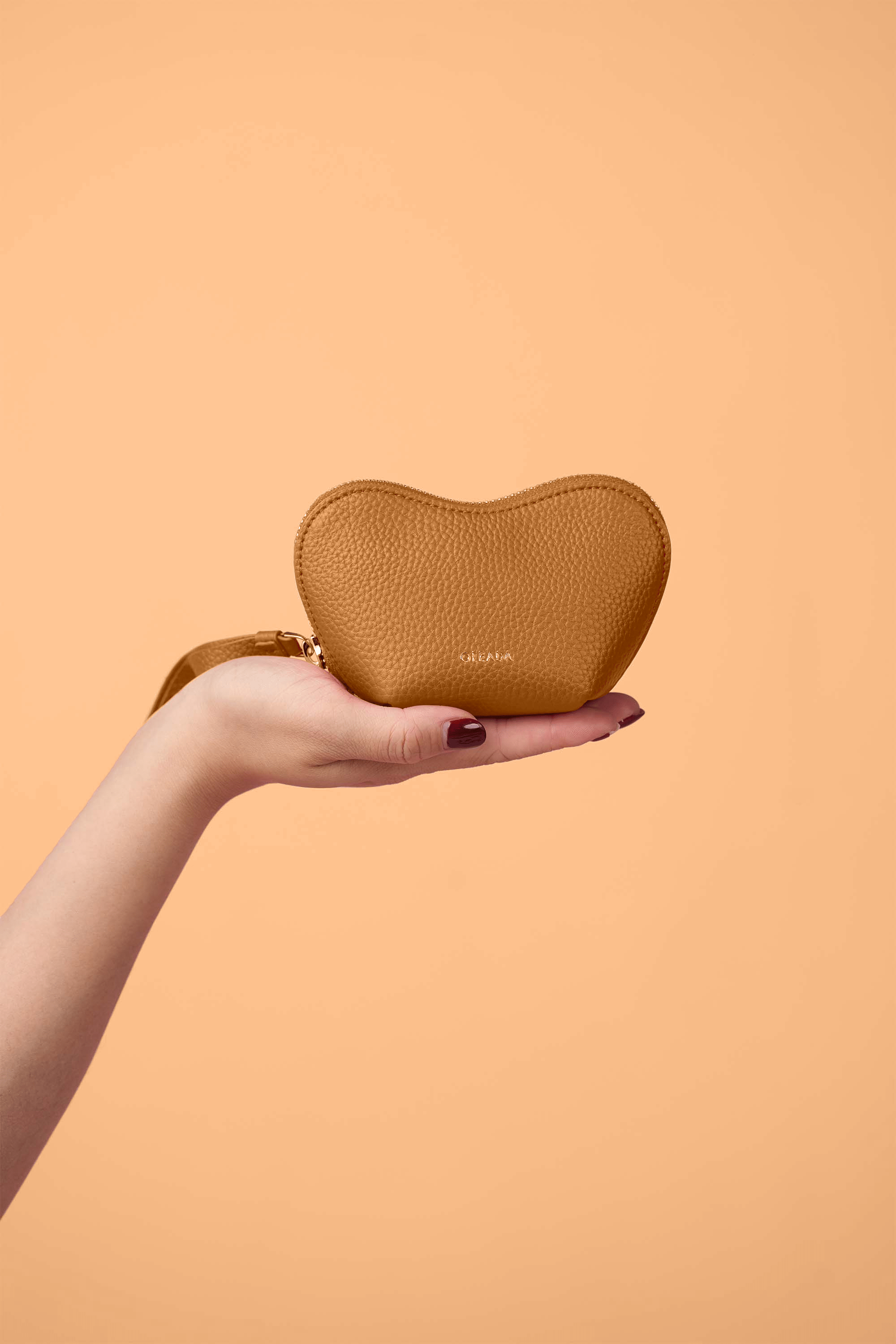 OLEADA NYC Apparel and Accessories > Women > Small Leather Goods > Leather Case Color_Honey Mini Le Coeur Pouch