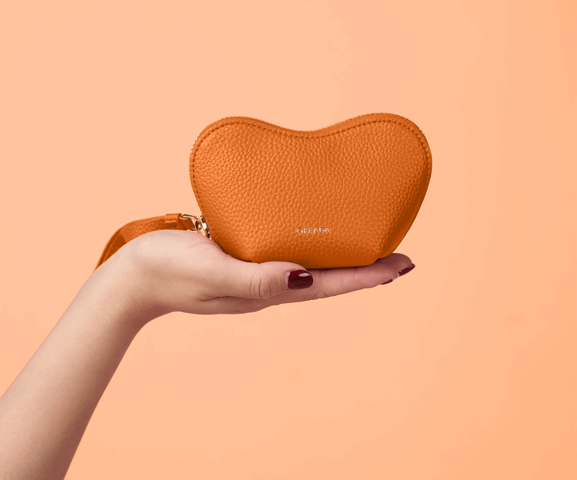 OLEADA NYC Apparel and Accessories > Women > Small Leather Goods > Leather Case Color_Marigold Mini Le Coeur Pouch (Mini)