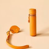 OLEADA NYC Apparel and Accessories > Women > Small Leather Goods > Leather Case Color_Marigold The Lip Capsule Charm