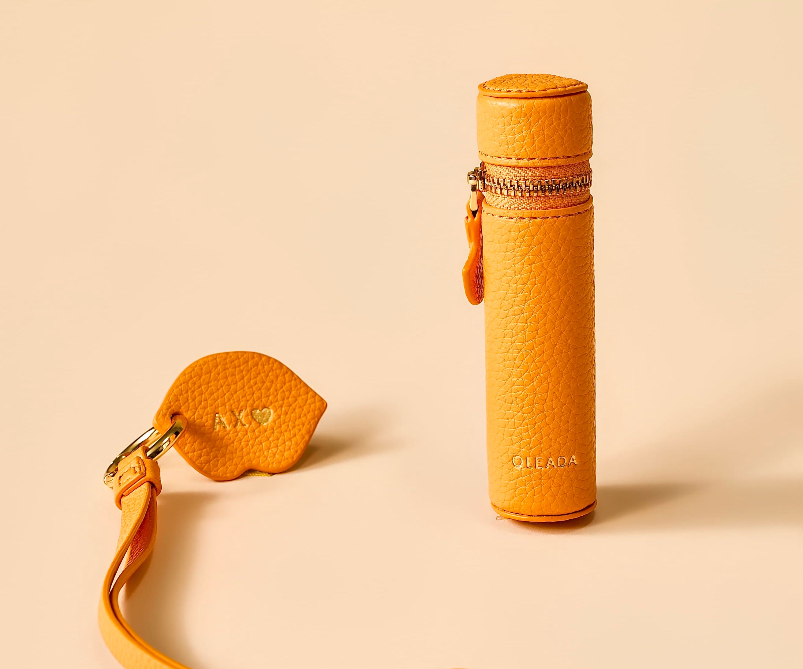 OLEADA NYC Apparel and Accessories > Women > Small Leather Goods > Leather Case Color_Marigold The Lip Capsule Charm