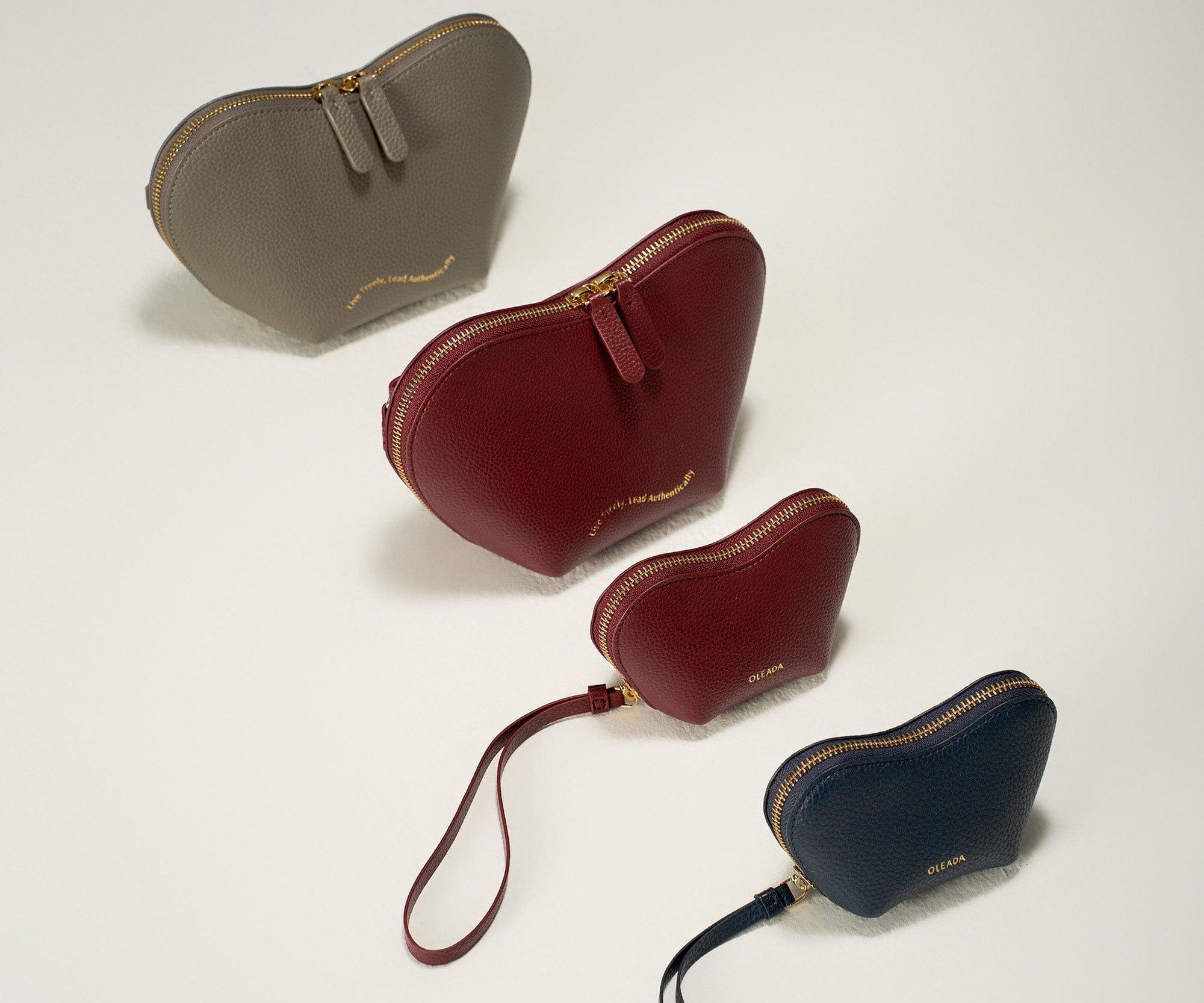 OLEADA NYC Apparel and Accessories > Women > Small Leather Goods > Leather Case Le Coeur Pouch (Regular)