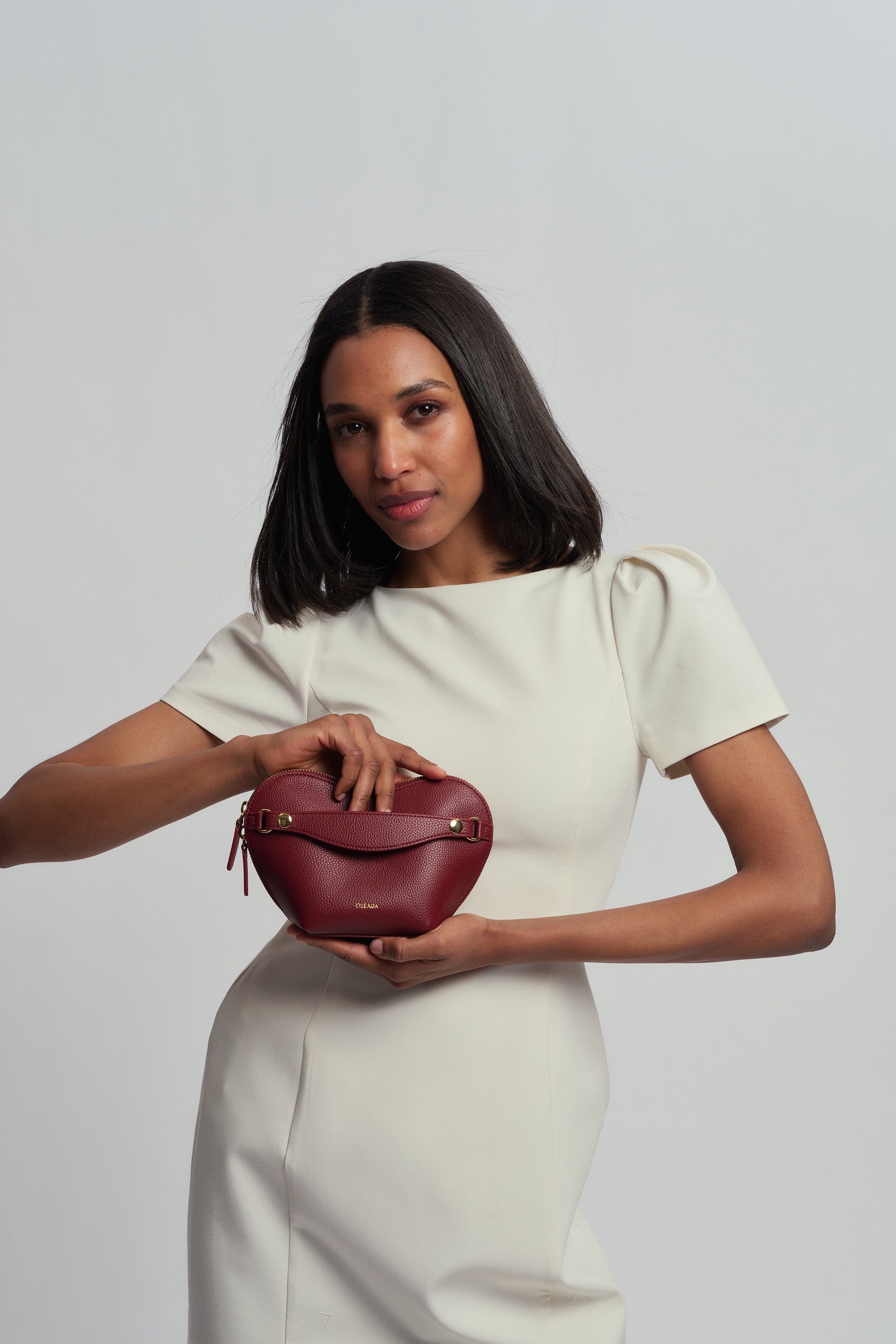 OLEADA NYC Apparel and Accessories > Women > Small Leather Goods > Leather Case Le Coeur Pouch (Regular)