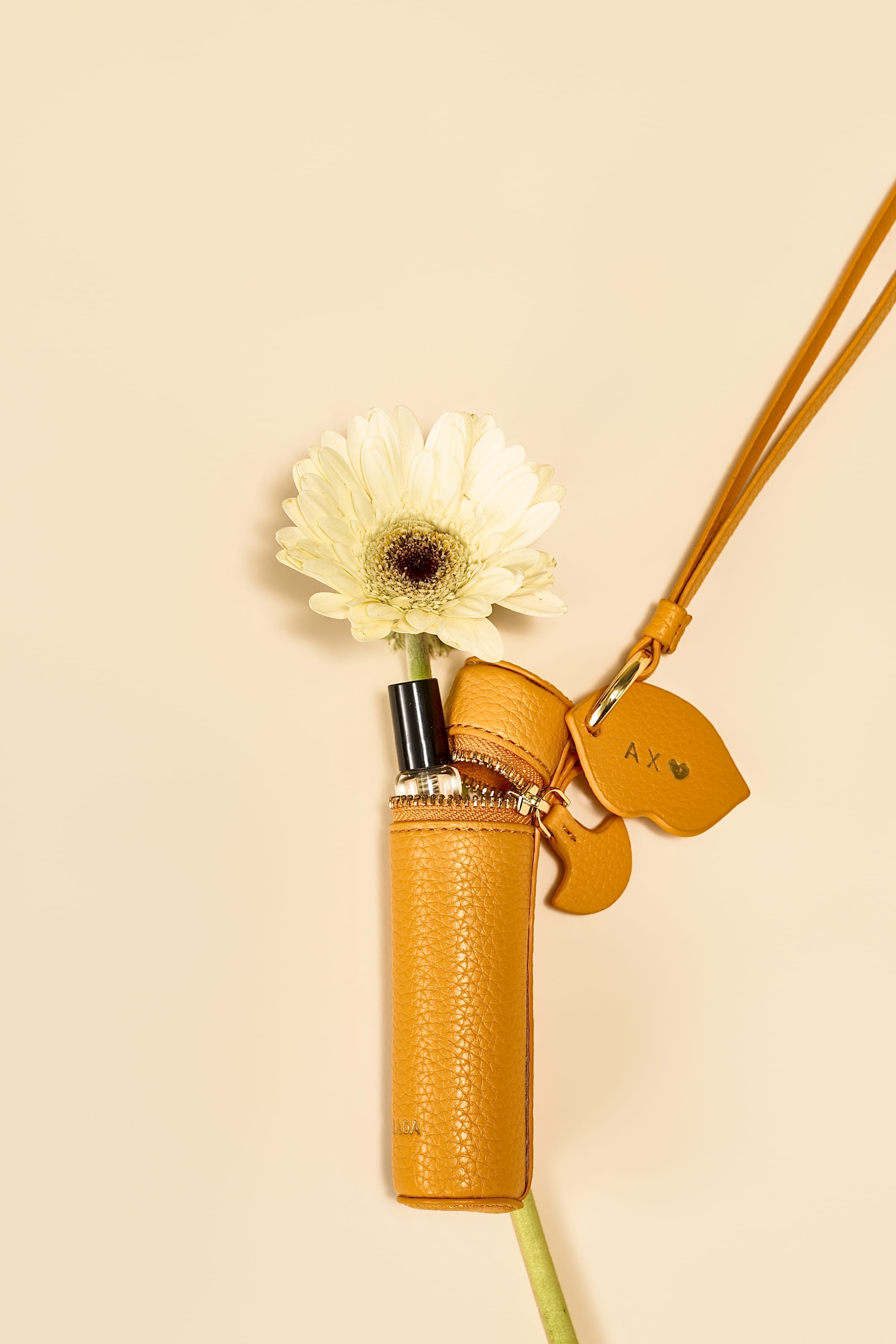 OLEADA NYC Apparel and Accessories > Women > Small Leather Goods > Leather Case The Lip Capsule Charm
