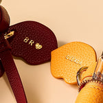 OLEADA NYC Apparel and Accessories > Women > Small Leather Goods > Leather Case The Lip Capsule Charm