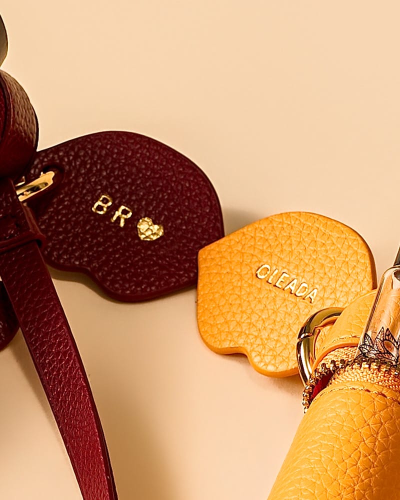 OLEADA NYC Apparel and Accessories > Women > Small Leather Goods > Leather Case The Lip Capsule Charm