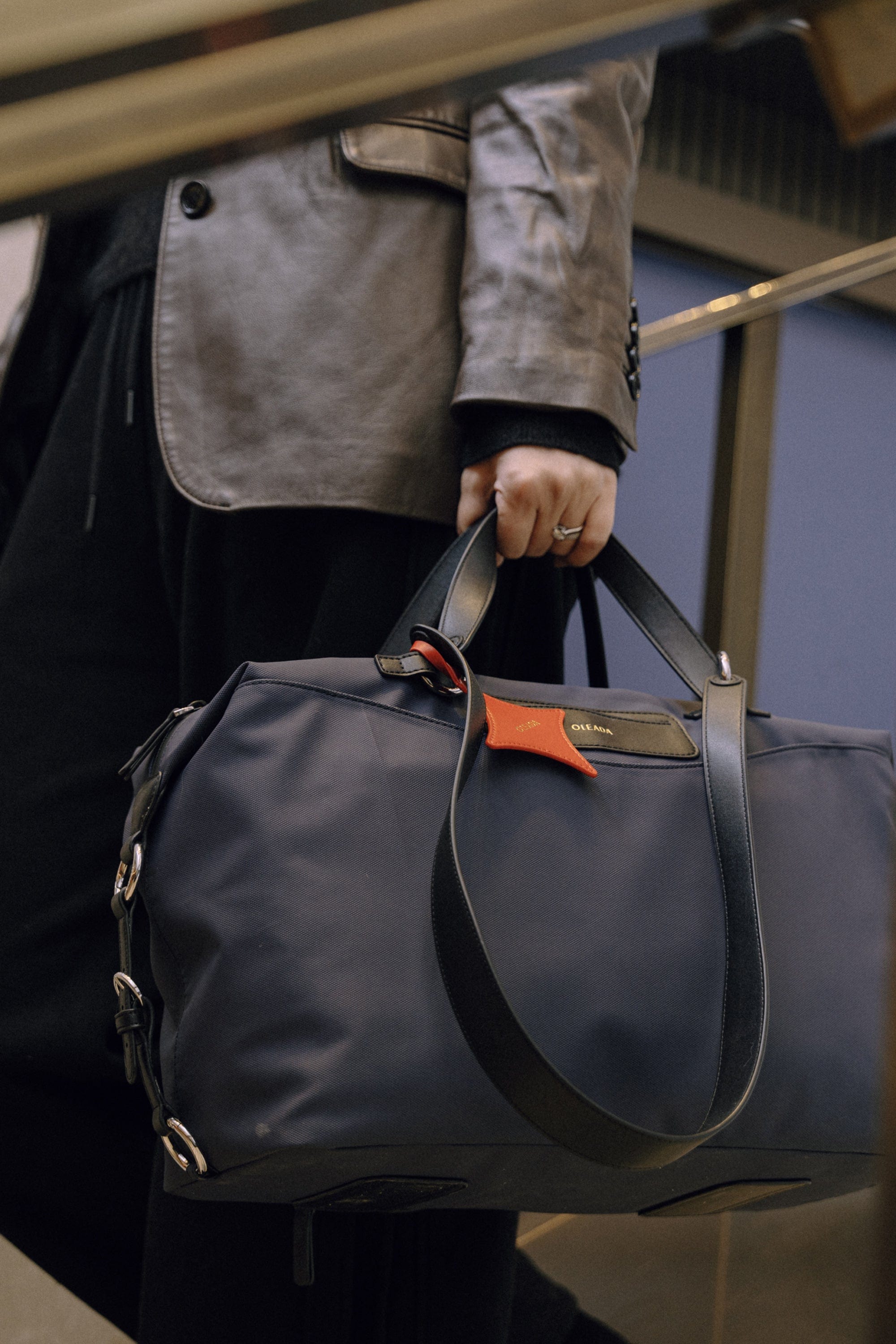 OLEADA NYC convertible travel bags > airport tote bags > overnight bags > water-resistant vegan bags > stylish multi-use bags AnyWear AnyDuffle