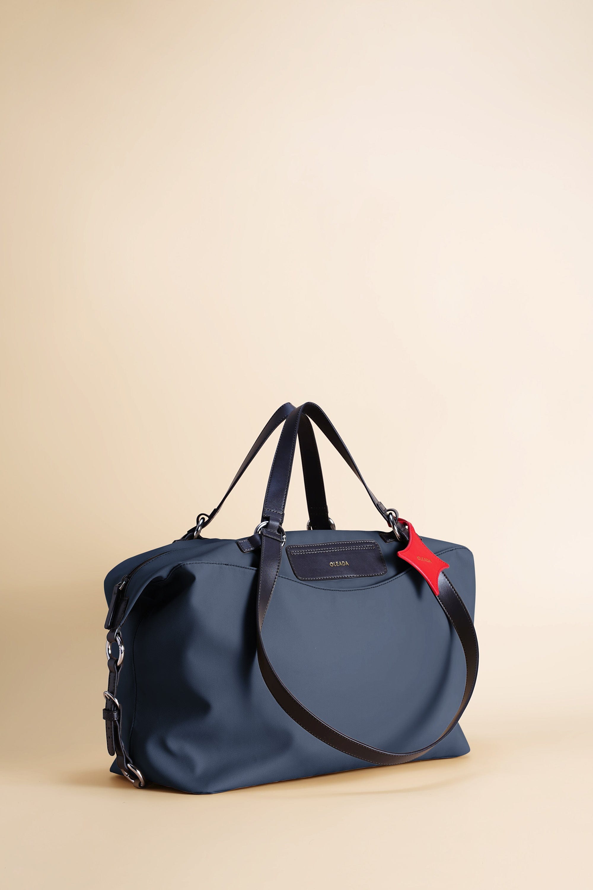 OLEADA NYC convertible travel bags > airport tote bags > overnight bags > water-resistant vegan bags > stylish multi-use bags AnyWear AnyDuffle