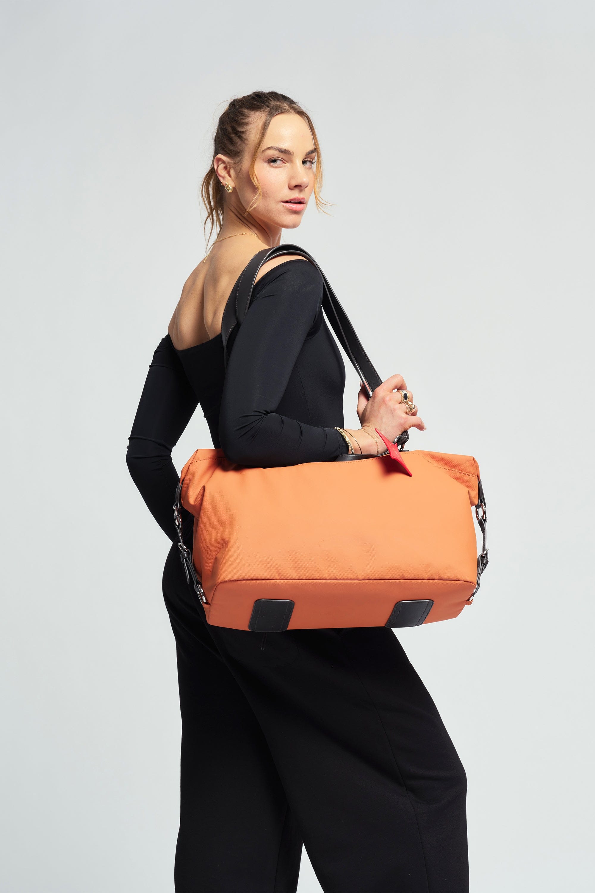 OLEADA NYC convertible travel bags > airport tote bags > overnight bags > water-resistant vegan bags > stylish multi-use bags AnyWear AnyDuffle