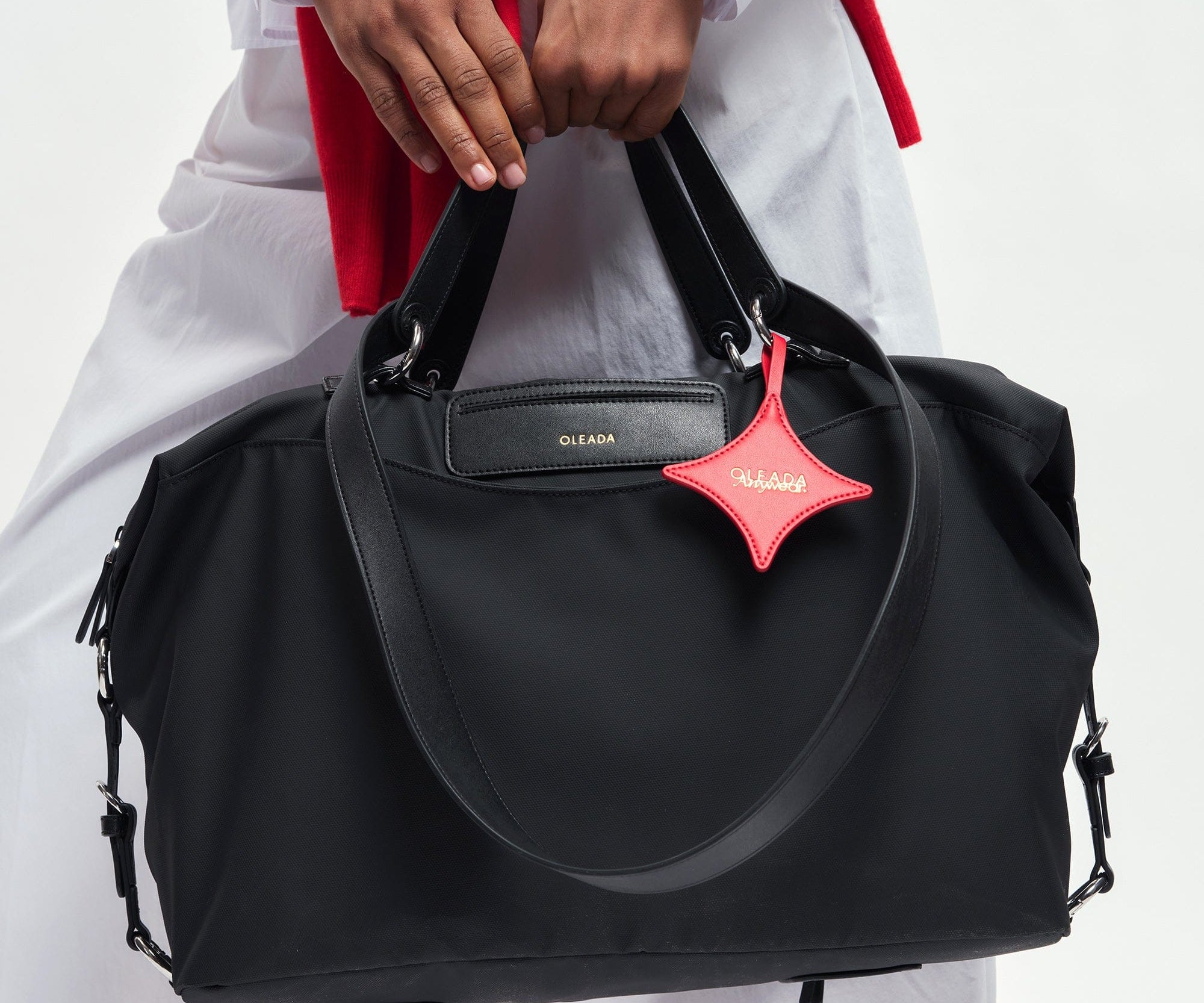 OLEADA NYC convertible travel bags > airport tote bags > overnight bags > water-resistant vegan bags > stylish multi-use bags AnyWear AnyDuffle