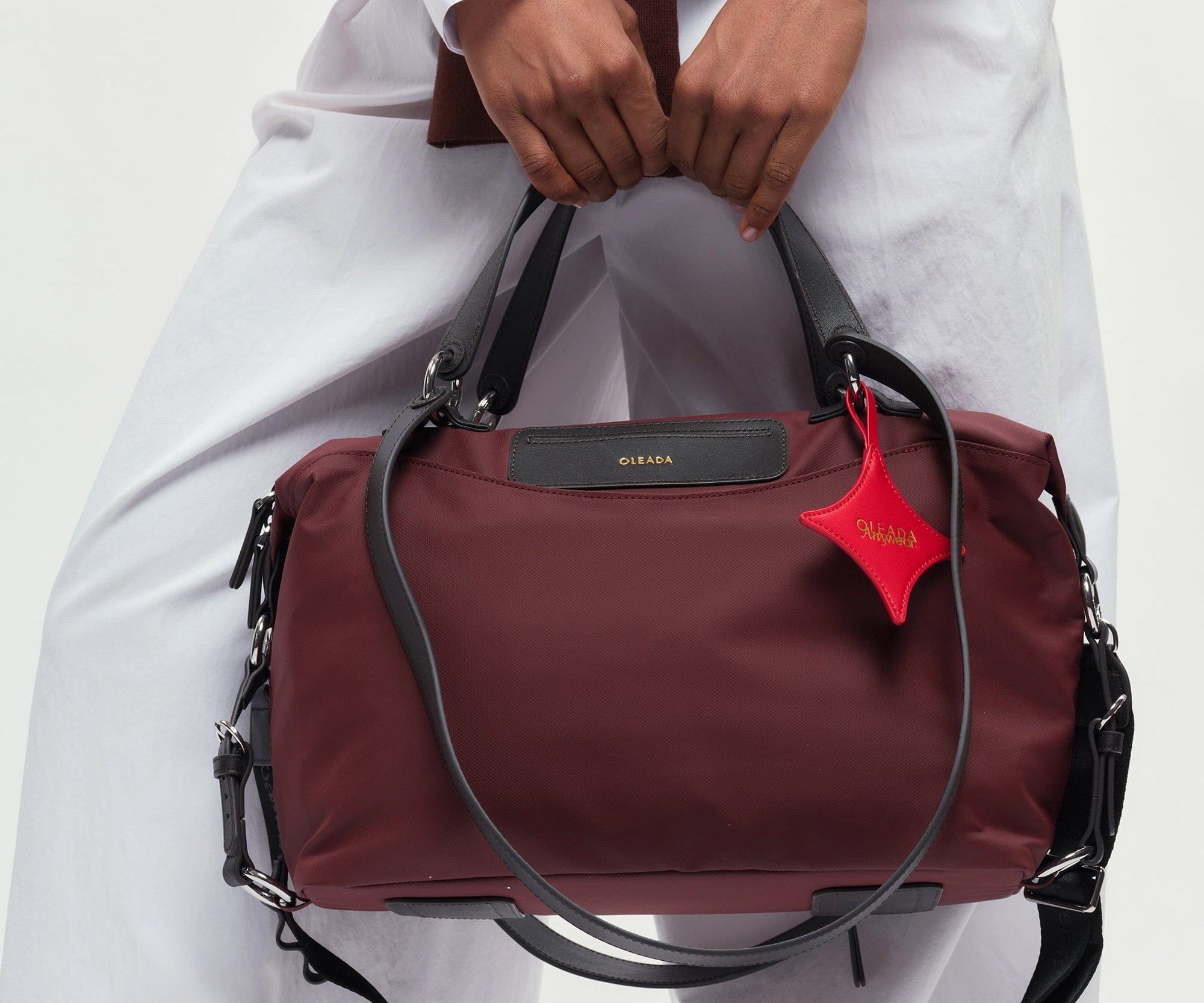 OLEADA NYC convertible travel bags > airport tote bags > overnight bags > water-resistant vegan bags > stylish multi-use bags AnyWear AnyDuffle City