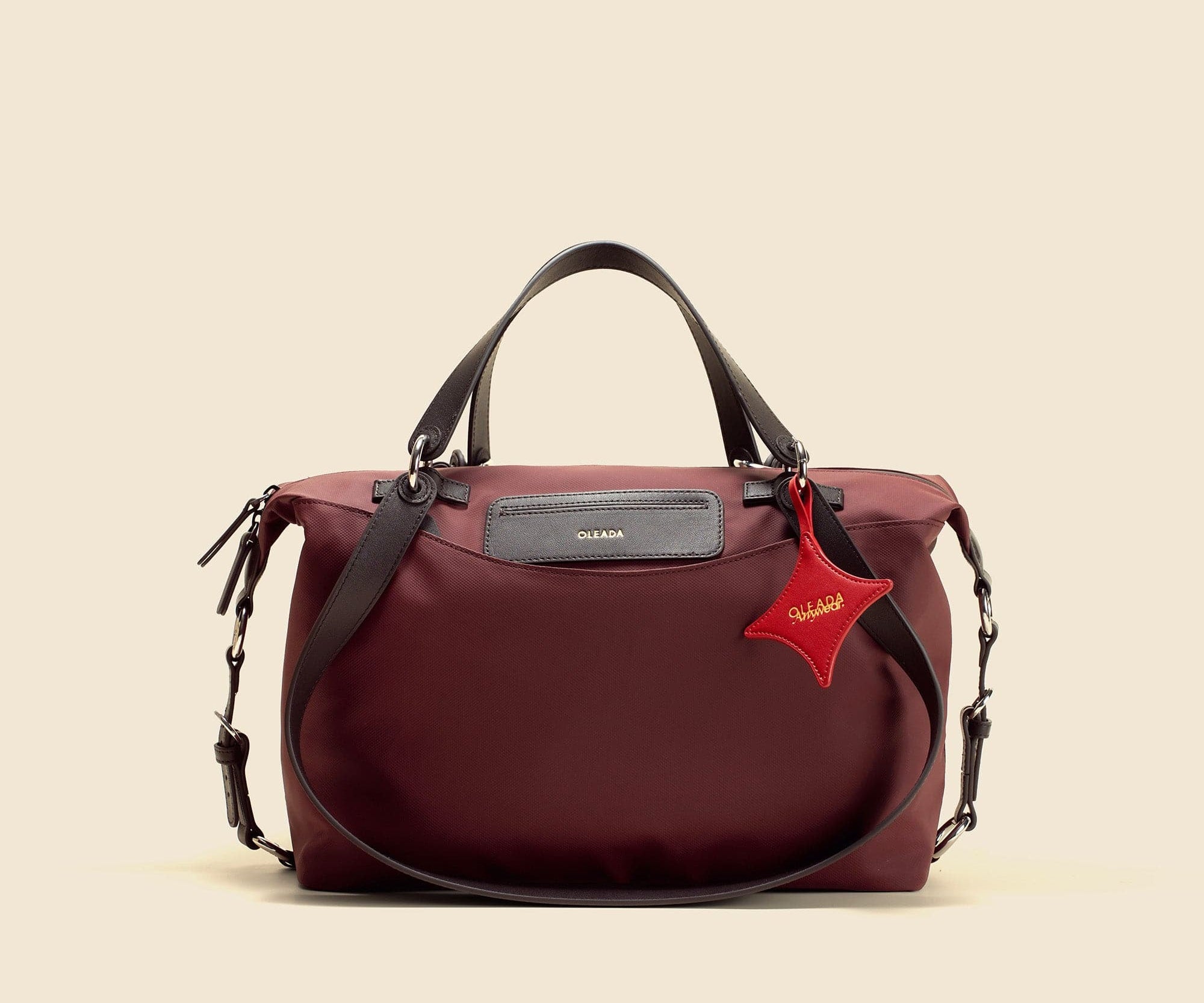 OLEADA NYC convertible travel bags > airport tote bags > overnight bags > water-resistant vegan bags > stylish multi-use bags Color_Bordeaux AnyWear AnyDuffle City
