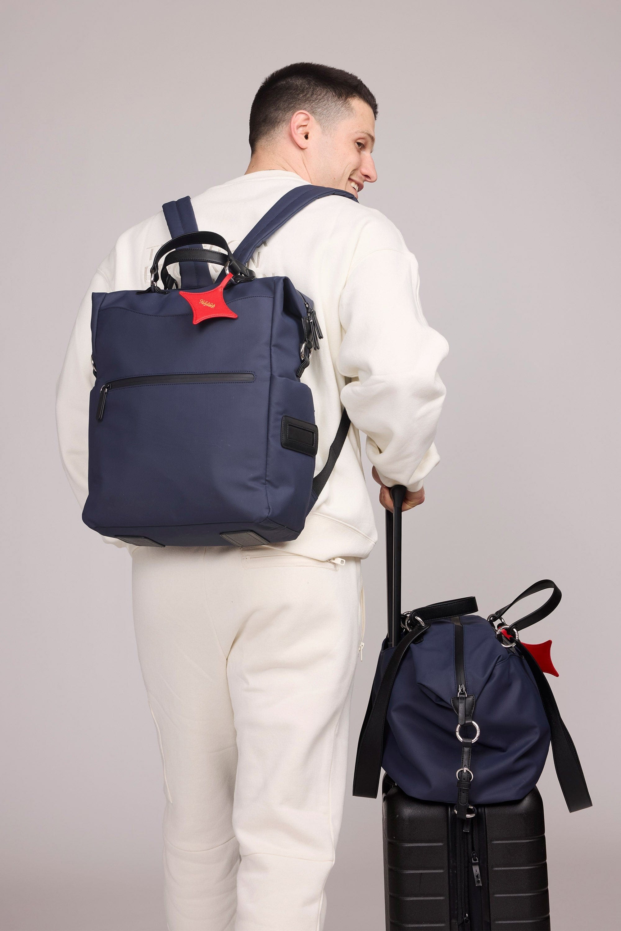 OLEADA NYC convertible travel bags > work-to-travel backpack > commuter bags > water-resistant vegan bags > stylish multi-use backpack AnyWear AnyBackpack