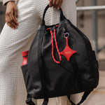 OLEADA NYC convertible travel bags > work-to-travel backpack > commuter bags > water-resistant vegan bags > stylish multi-use backpack AnyWear Tennis Backpack