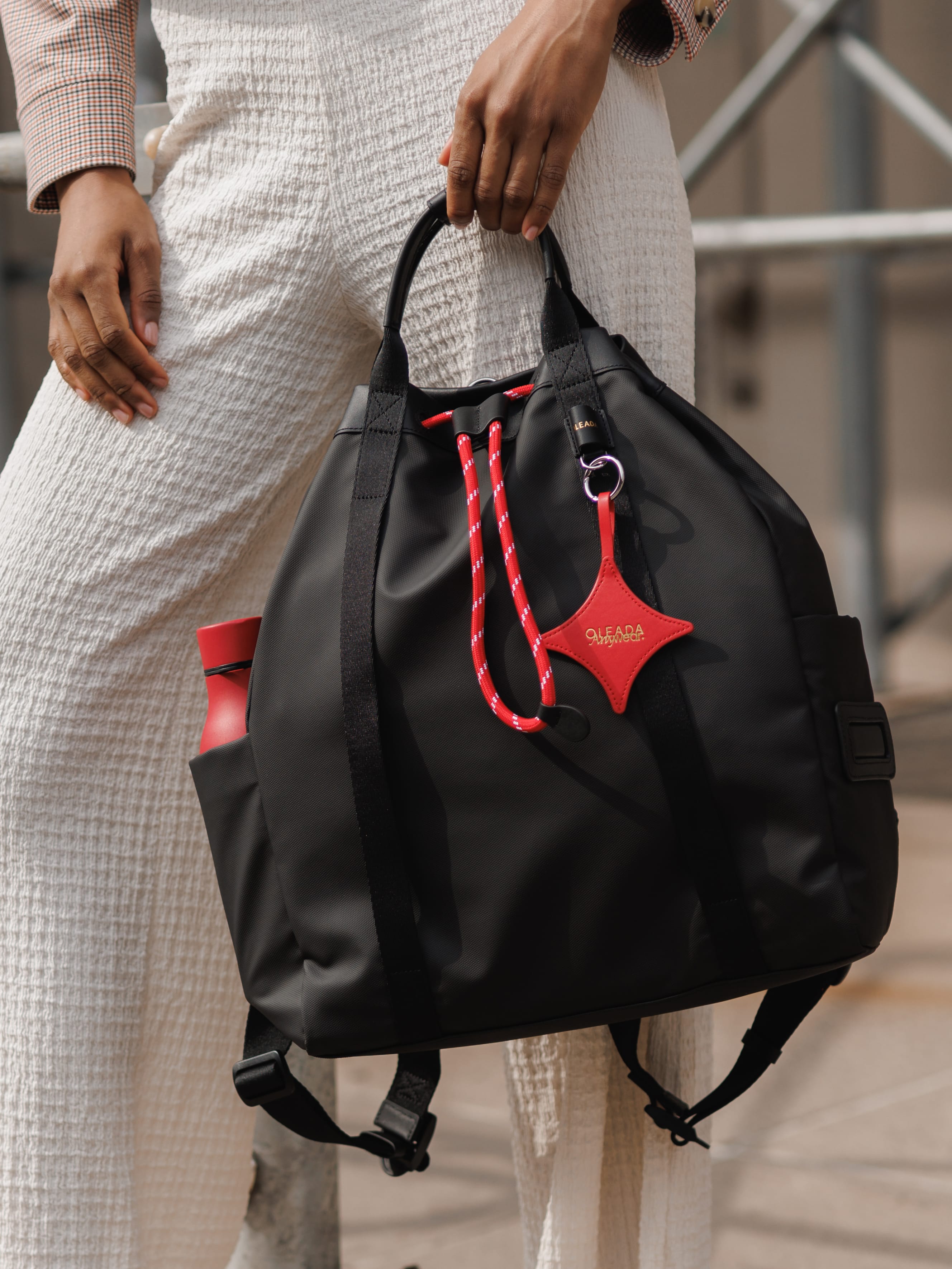 OLEADA NYC convertible travel bags > work-to-travel backpack > commuter bags > water-resistant vegan bags > stylish multi-use backpack AnyWear Tennis Backpack