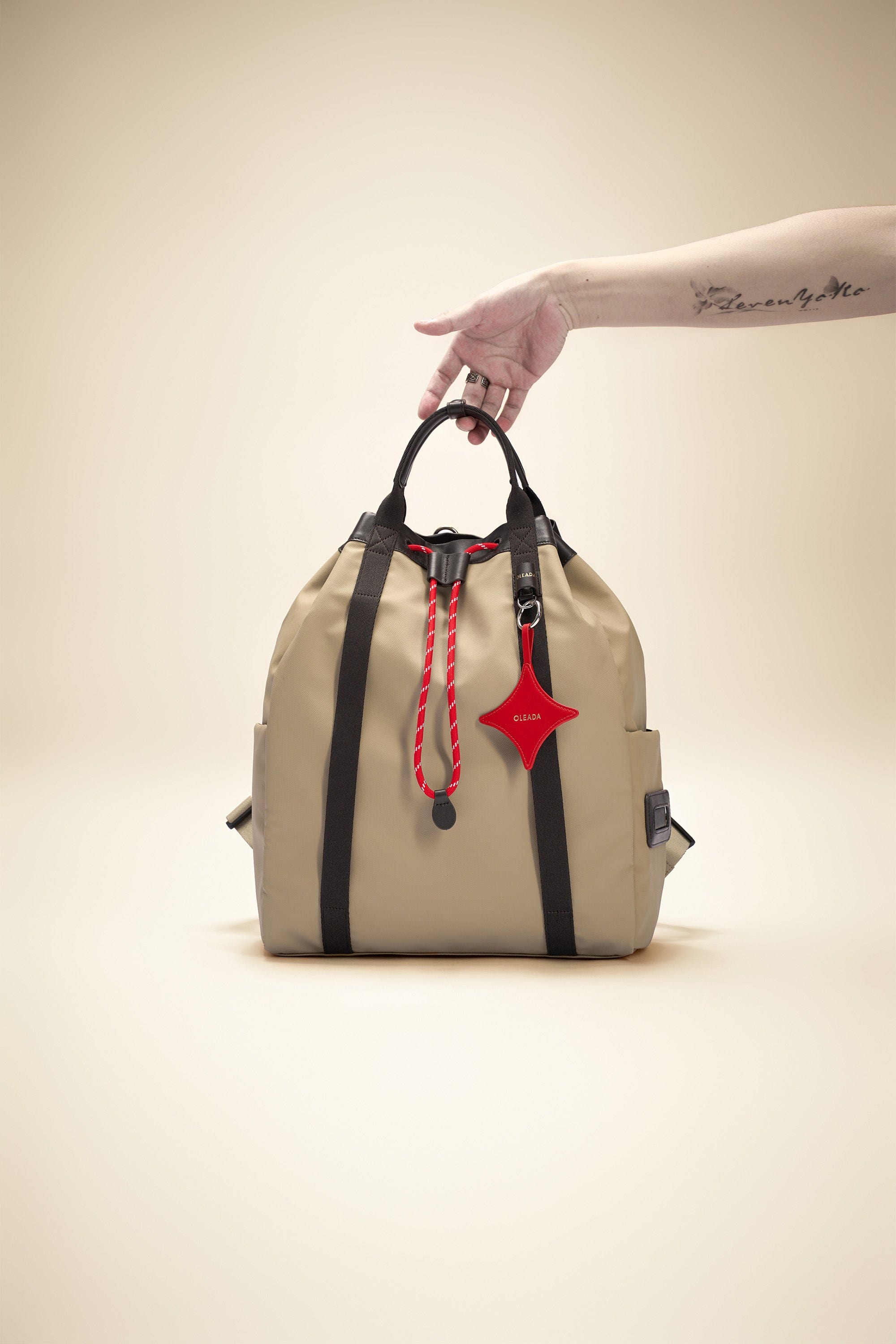 OLEADA NYC convertible travel bags > work-to-travel backpack > commuter bags > water-resistant vegan bags > stylish multi-use backpack Color_Abu Dhabi AnyWear Tennis Backpack