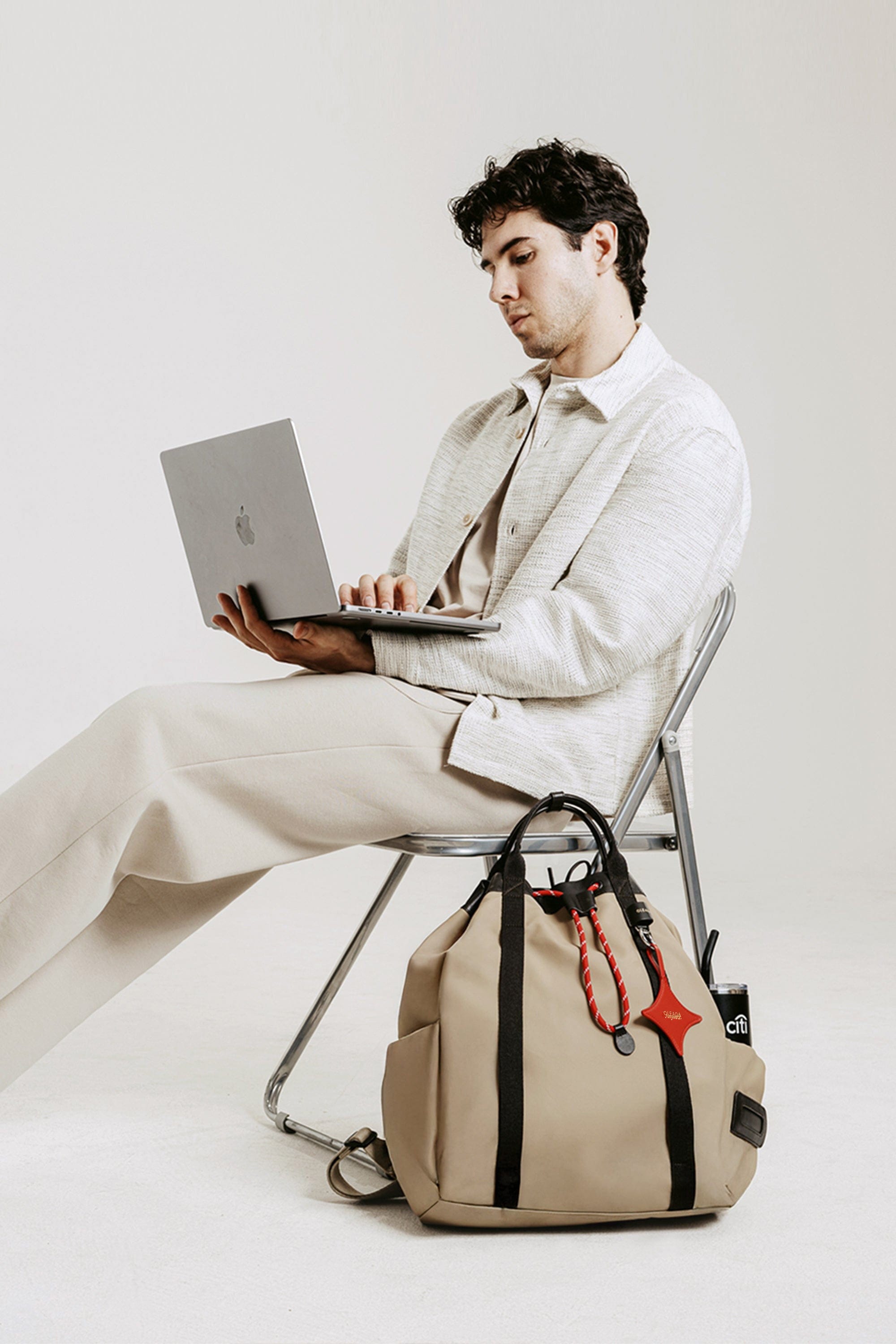 OLEADA NYC convertible travel bags > work-to-travel backpack > commuter bags > water-resistant vegan bags > stylish multi-use backpack Color_Abu Dhabi AnyWear Tennis Backpack