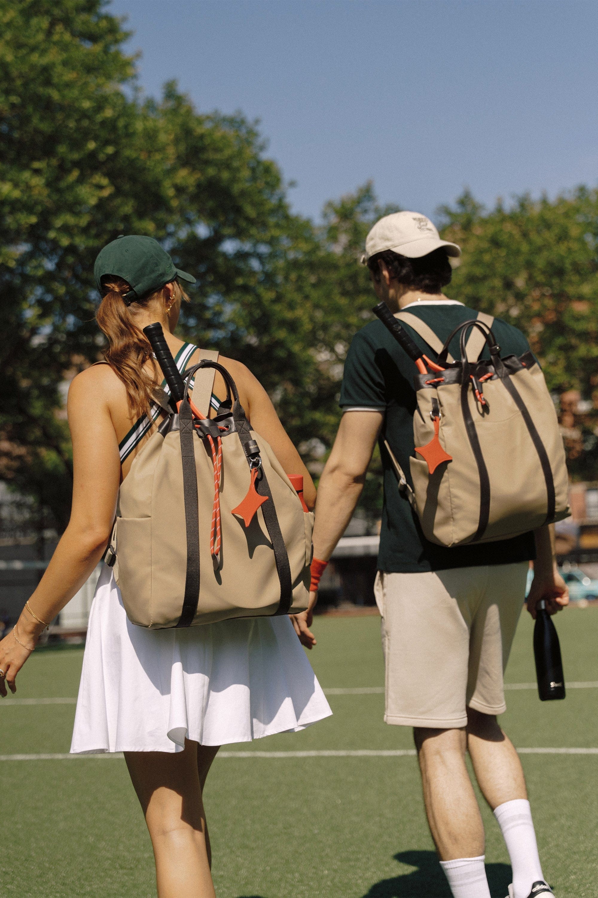 OLEADA NYC convertible travel bags > work-to-travel backpack > commuter bags > water-resistant vegan bags > stylish multi-use backpack Color_Abu Dhabi AnyWear Tennis Backpack