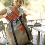 OLEADA NYC convertible travel bags > work-to-travel backpack > commuter bags > water-resistant vegan bags > stylish multi-use backpack Color_Abu Dhabi AnyWear Tennis Backpack