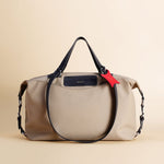 OLEADA NYC Convertible Travel Bags > Work-to-Travel Duffle Bags > Organized Carry Bags > Water-Resistant Vegan Bags > Stylish Multi-Use Bags Color_Tan / Vegan Anywear AnyDuffle