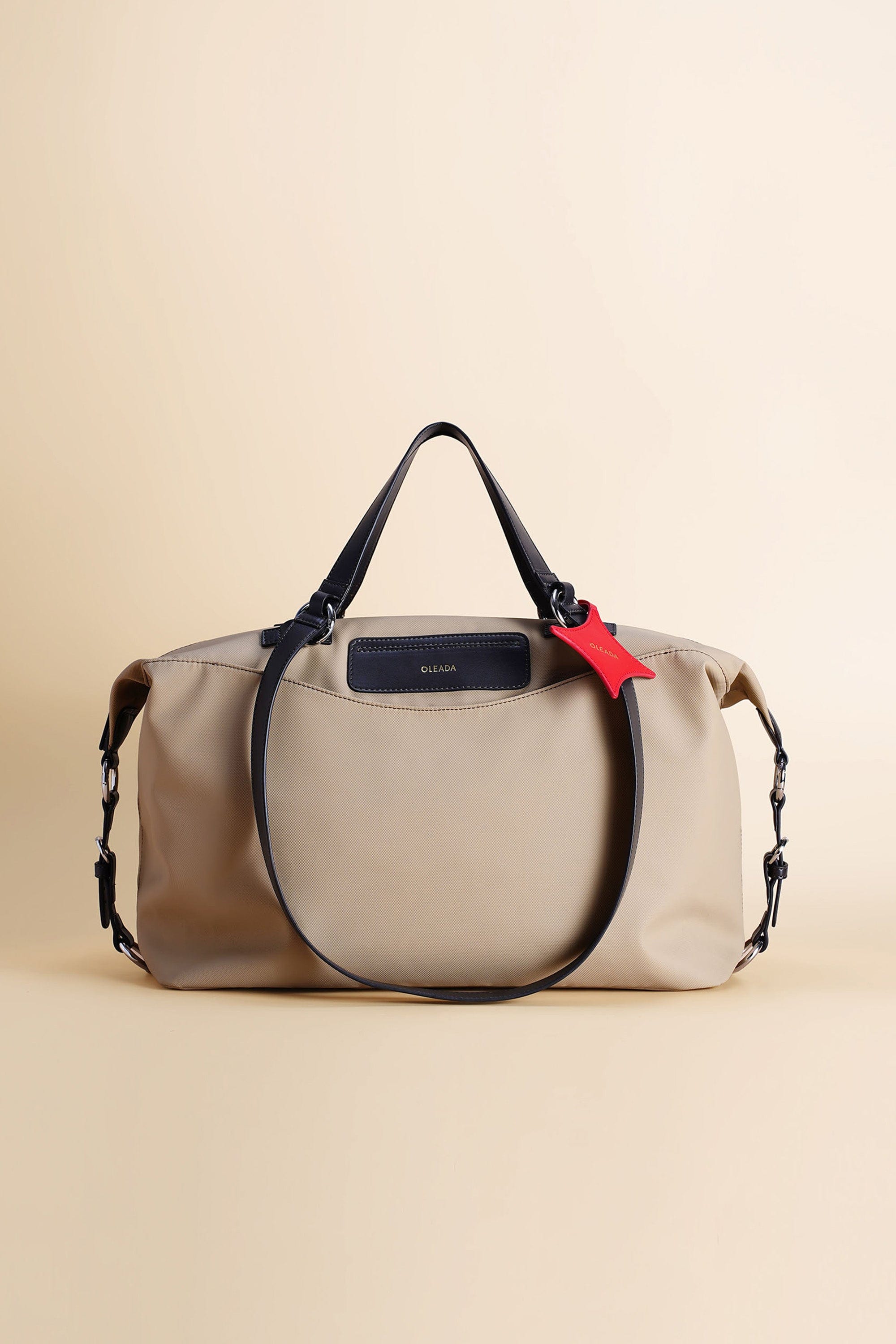 OLEADA NYC Convertible Travel Bags > Work-to-Travel Duffle Bags > Organized Carry Bags > Water-Resistant Vegan Bags > Stylish Multi-Use Bags Color_Tan / Vegan Anywear AnyDuffle