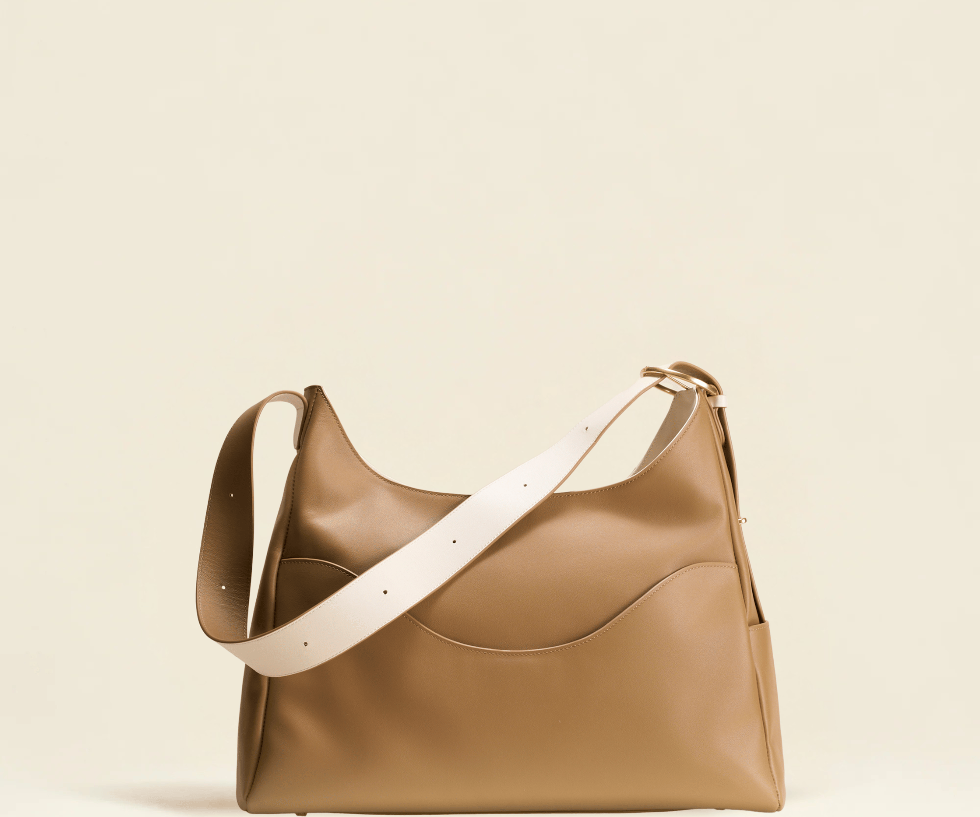 OLEADA NYC Mini Hobo Bag > Women Leather Bag For All Occasions > multiple interior and exterior pockets with a laptop compartment > 13 inch laptop bag > convertible to shoulder bag Color_Toffee Reverie Hobo