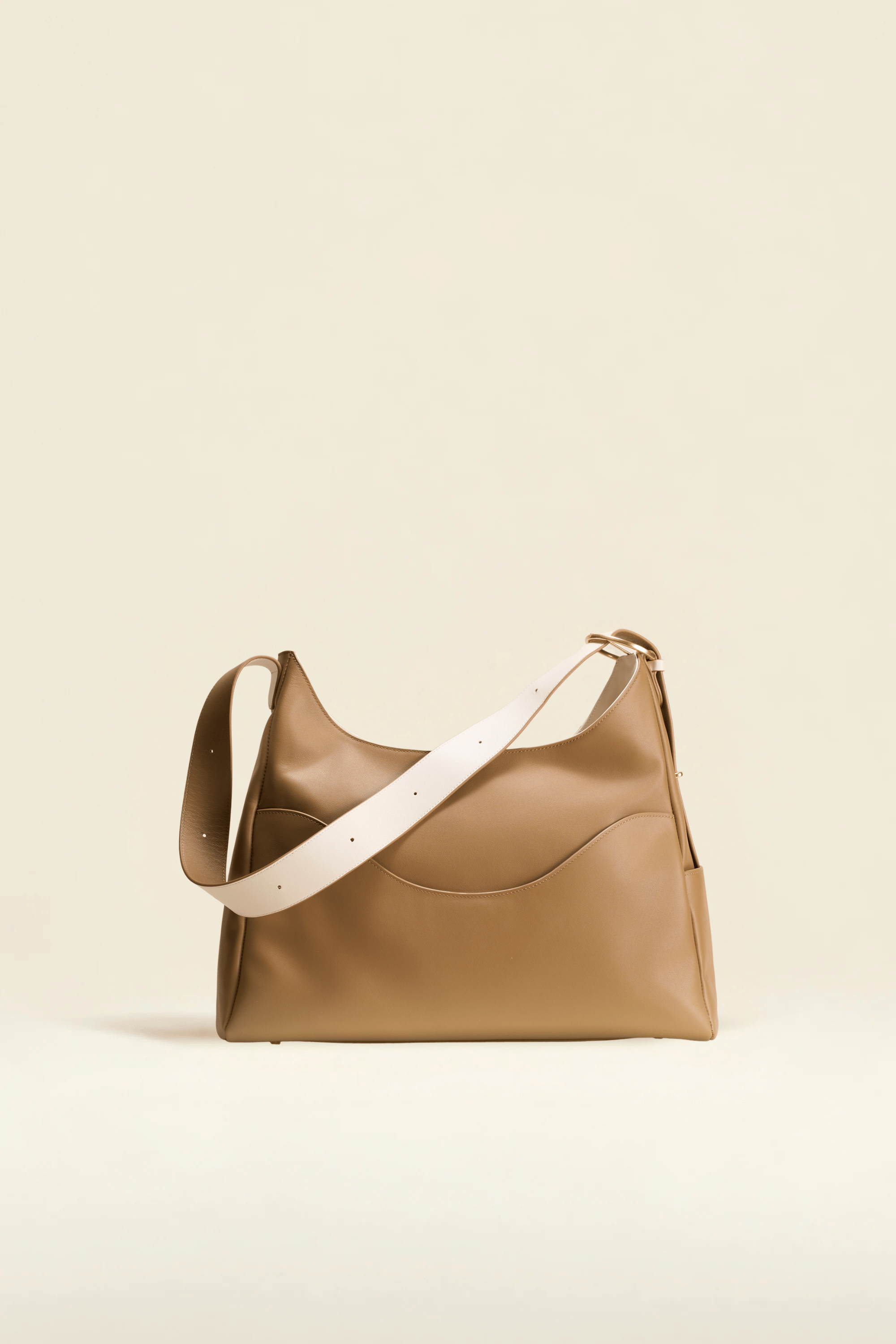 OLEADA NYC Mini Hobo Bag > Women Leather Bag For All Occasions > multiple interior and exterior pockets with a laptop compartment > 13 inch laptop bag > convertible to shoulder bag Color_Toffee Reverie Hobo