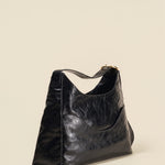 OLEADA NYC Mini Hobo Bag > Women Leather Bag For All Occasions > multiple interior and exterior pockets with a laptop compartment > 13 inch laptop bag > convertible to shoulder bag Reverie Hobo