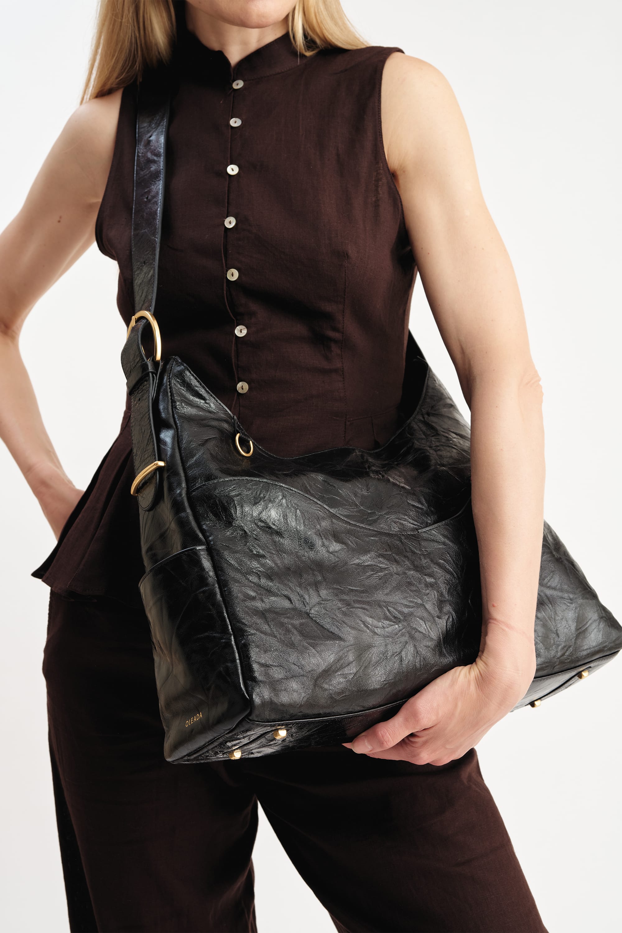 OLEADA NYC Mini Hobo Bag > Women Leather Bag For All Occasions > multiple interior and exterior pockets with a laptop compartment > 13 inch laptop bag > convertible to shoulder bag Reverie Hobo