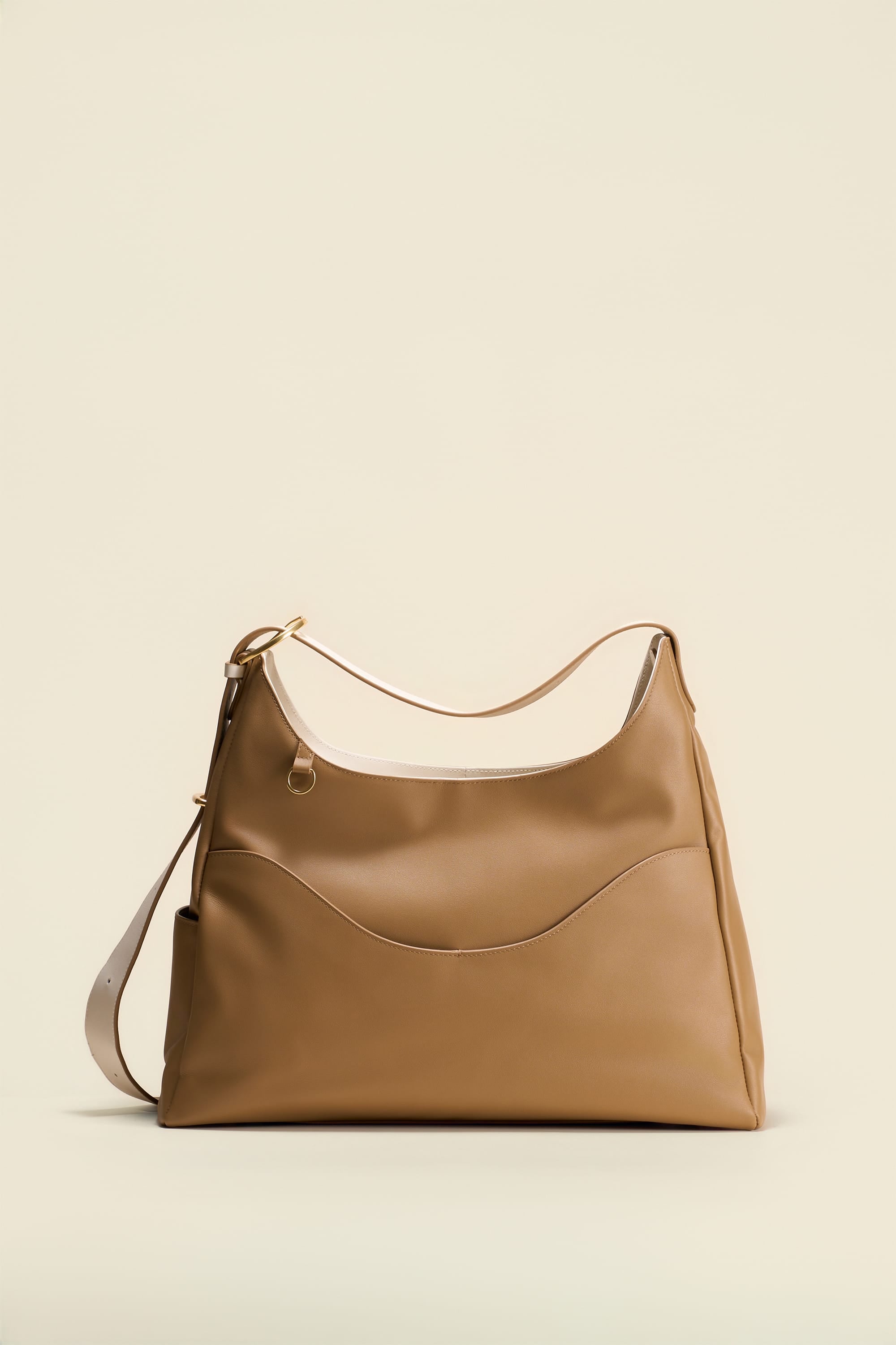 OLEADA NYC Mini Hobo Bag > Women Leather Bag For All Occasions > multiple interior and exterior pockets with a laptop compartment > 13 inch laptop bag > convertible to shoulder bag Reverie Hobo