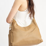 OLEADA NYC Mini Hobo Bag > Women Leather Bag For All Occasions > multiple interior and exterior pockets with a laptop compartment > 13 inch laptop bag > convertible to shoulder bag Reverie Hobo